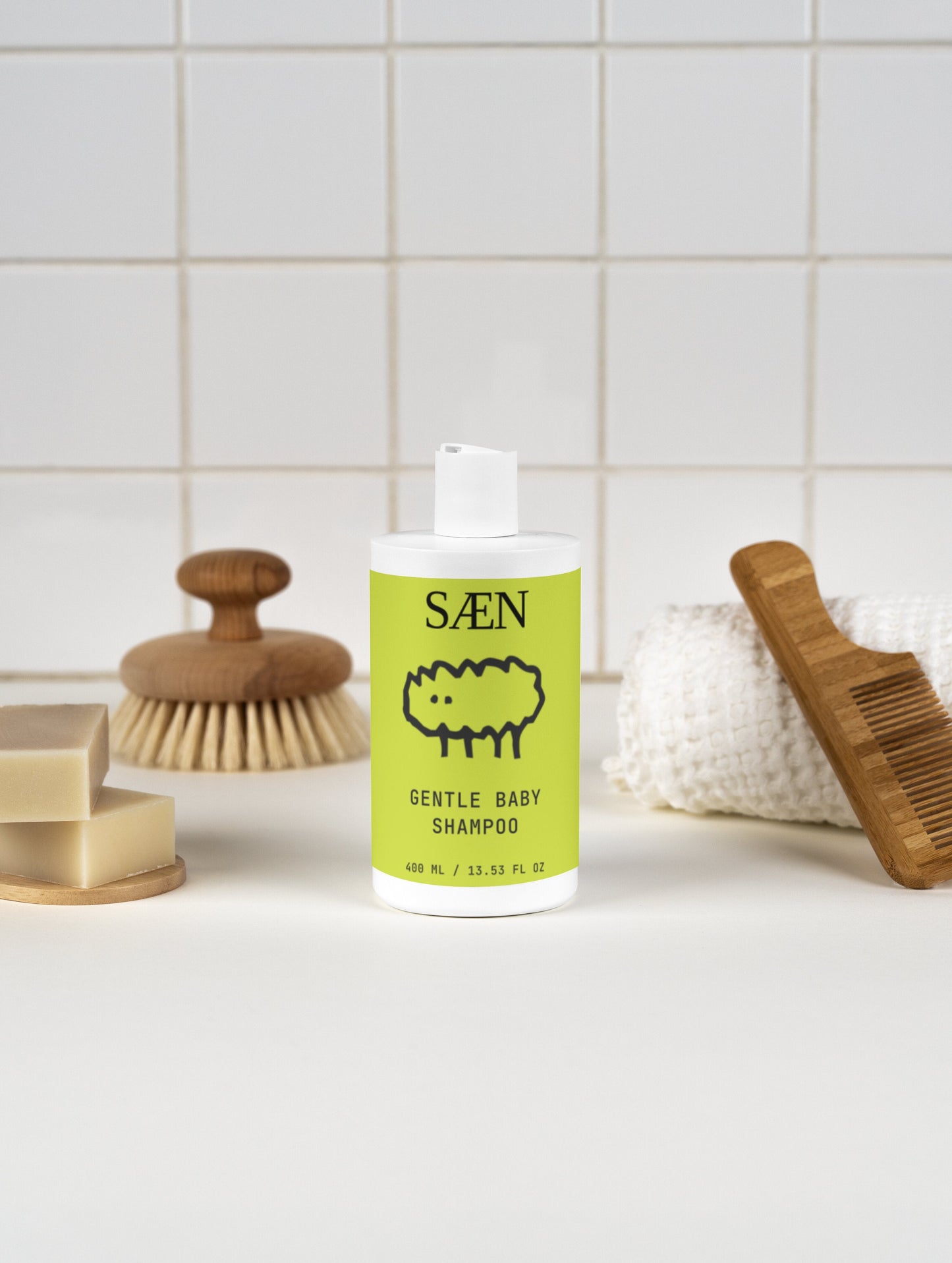 Bottle of Selfnamed Gentle Baby Shampoo with soft, baby-friendly label and a gentle, nourishing formula for delicate skin.