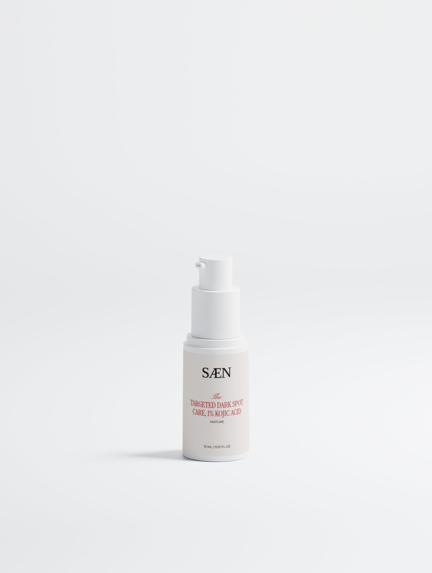 Selfnamed Targeted Dark Spot Care with 1% Kojic Acid, featuring a sleek tube and applicator for targeted skin treatment.