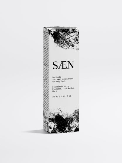 Selfnamed Foundation with Peptides in 25 Medium Warm shade, showcasing smooth, natural-looking makeup on model's face.