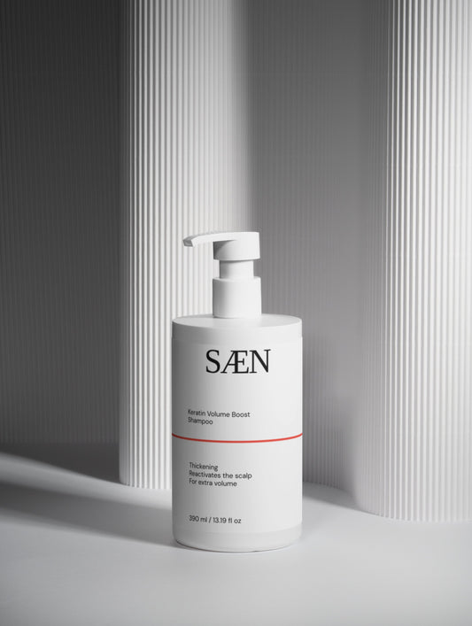 Selfnamed Keratin Volume Boost Shampoo bottle with label, showing thick, voluminous hair and the product's packaging.