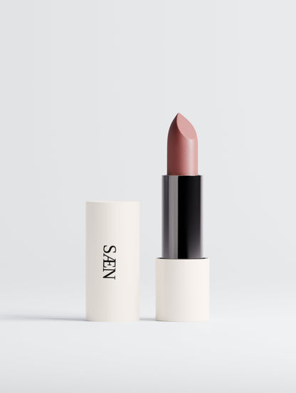 Selfnamed matte lipstick in Dusty Rose shade, showing the sleek tube and the creamy lipstick bullet.